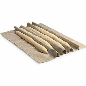 Dough resting on a baking couche