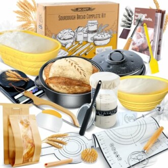 Complete sourdough bread baking kit with tools and ingredients.
